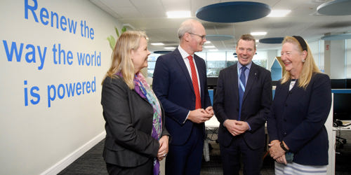 Minister Simon Coveney speaks with Kevin O Donovan in the Statkraft office